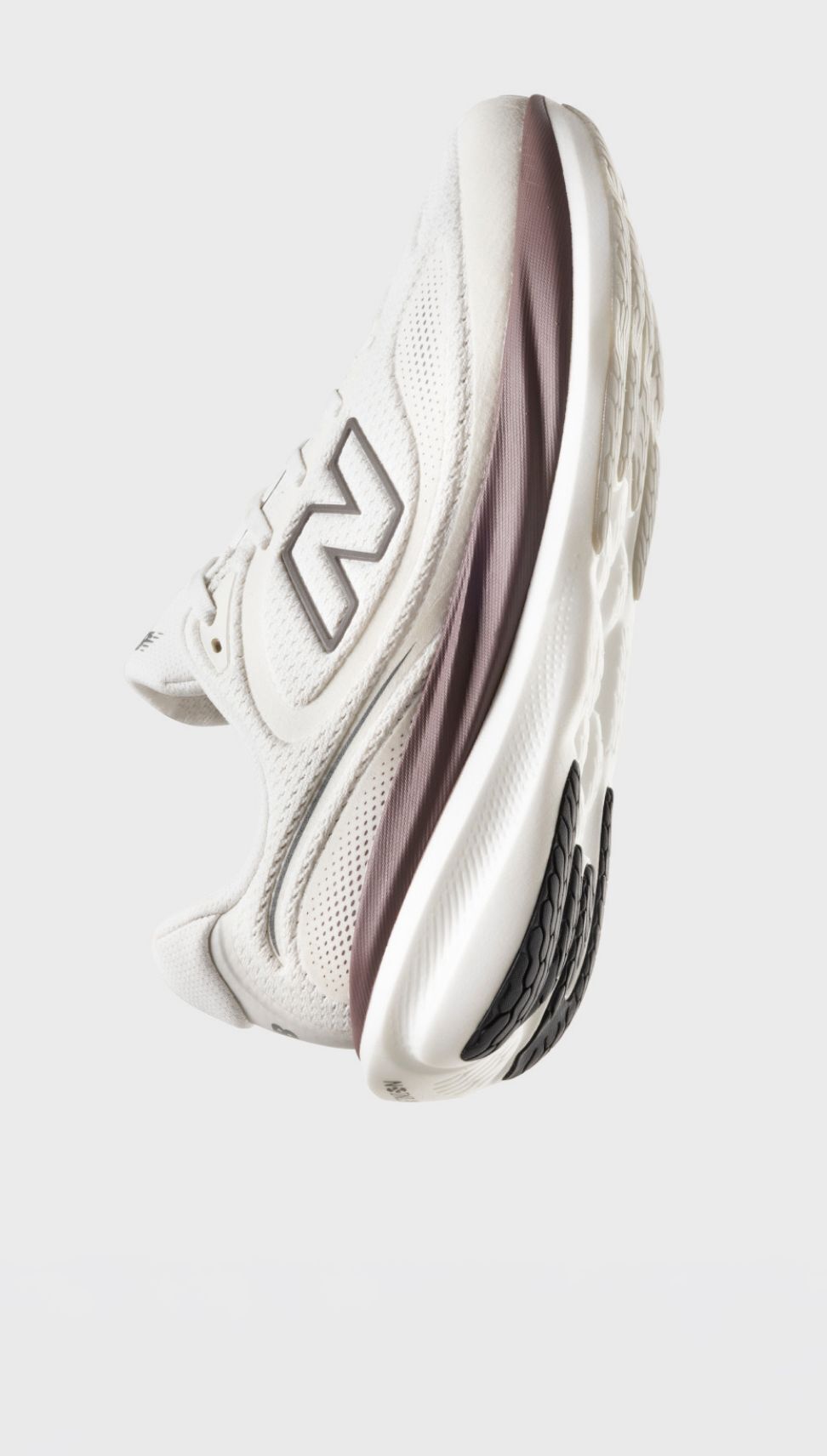 One 1080 shoe on a grey background. 